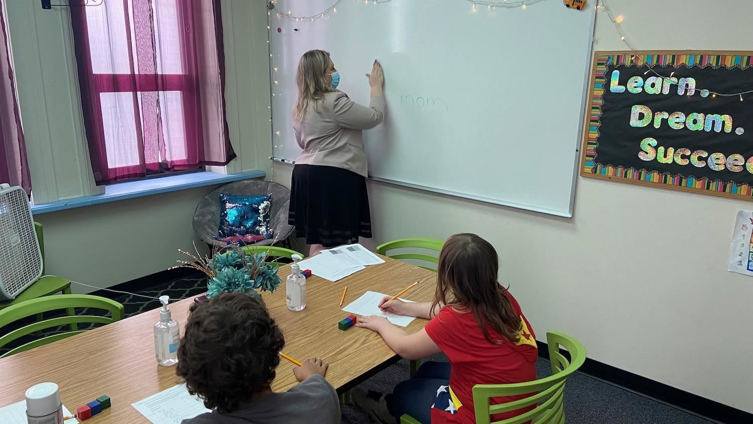 School psychologist working with students